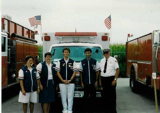 The ambulance crew for the Honey Brook Fire Co. housing parade in front of Ambulance 4-9. L to R: Sharon Long, Martha Riehl, Mike Killinger, Ken Eberly, Chief Parmer... 7/8/92